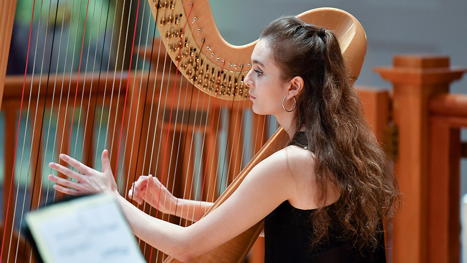 RCM harp student performing in AFCH